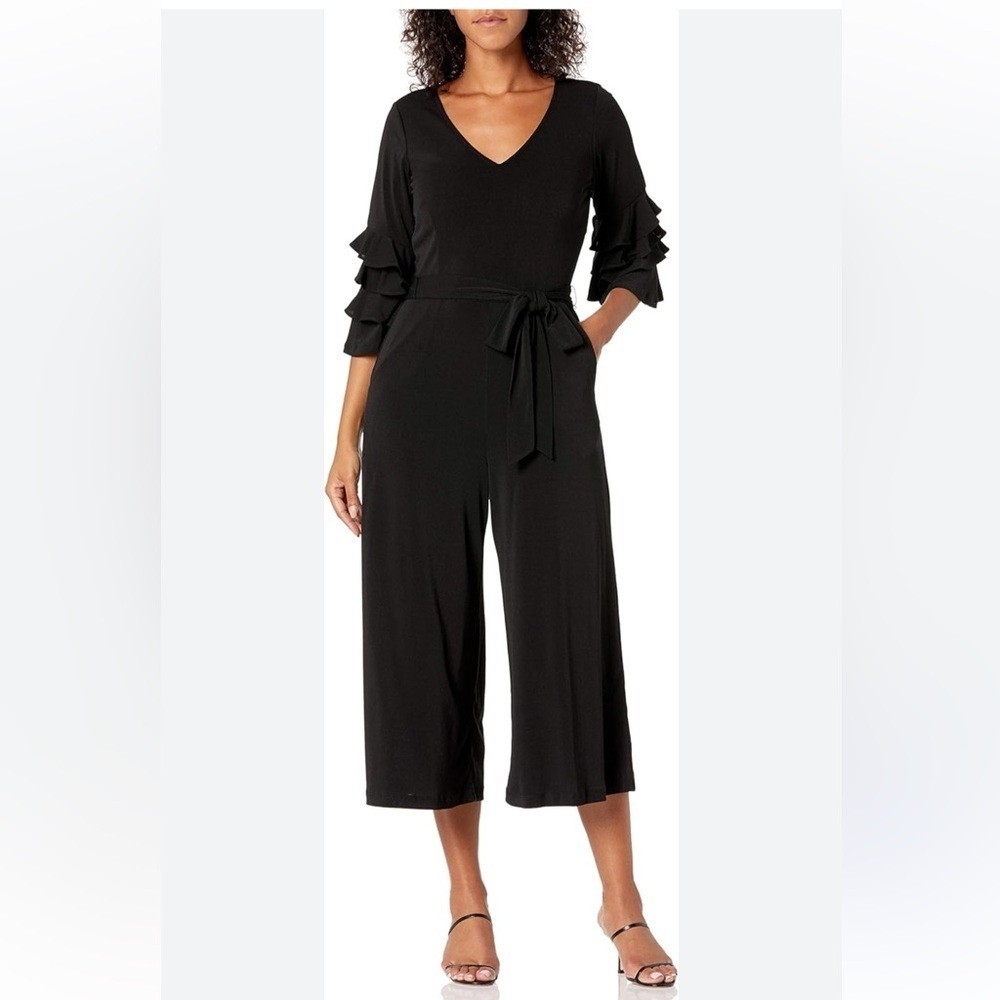 Gabby Skye Black Jumpsuit. Ruffle Sleeve Size-4 V-Exposed Zipper Modern Classic